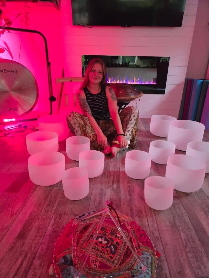 Helena Christie among crystal singing bowls